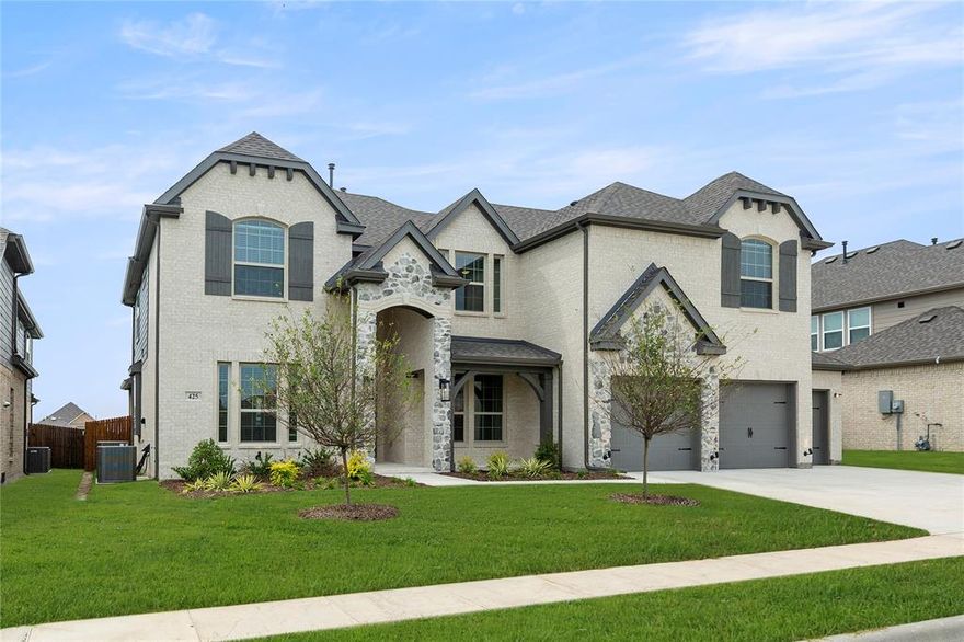 MLS# 20977464 - Built by First Texas Homes - Ready Now! ~ Located in Woodcreek, Fate, TX, this thoughtfully designed home offers 5 bedrooms, 5 bathrooms, and 3226 sq ft of flexible living space that’s built for real life. Whether you're gathering with loved ones or enjoying a quiet moment, this home gives you the space — and comfort — to do both. Inside, you’ll find features like a stunning elevation with a front porch, cedar accents, and a 3-car garage. High18' flat ceilings extend through the family room with double stacked windows and a multi-slider door leading to an oversized covered patio. The chef's kitchen boasts a butler's pantry, stainless steel appliances, 42-inch custom Shaker cabinets, and a large island; downstairs, a versatile study doubles as a potential main-floor bedroom, designed to make everyday living easier and more enjoyable. With close access to I-30 for easy commutes to Downtown Dallas and Rockwall, with access to shopping, dining, and Lake Ray Hubbard adventures, you’ll enjoy the convenience of everything you need—without giving up the peace of coming home. If you’re looking for a home that fits your life, we’d love to show you around. Schedule your private tour today.