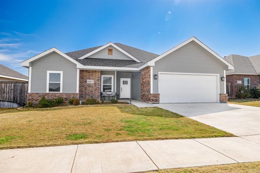Located in Forrest Meadows in Wylie ISD, this thoughtfully designed home features an open concept, split bedroom layout with crown molding and durable vinyl flooring throughout the main living areas, with carpet in the bedrooms for added comfort. The kitchen offers white custom cabinetry with soft close hinges, granite countertops, and plenty of workspace for everyday living and entertaining. The private primary suite includes a relaxing soaking tub, separate walk in shower, and a spacious walk in closet. Enjoy outdoor living on the large covered back porch and the convenience of a fenced yard. Energy efficient features include a programmable thermostat for year round comfort.