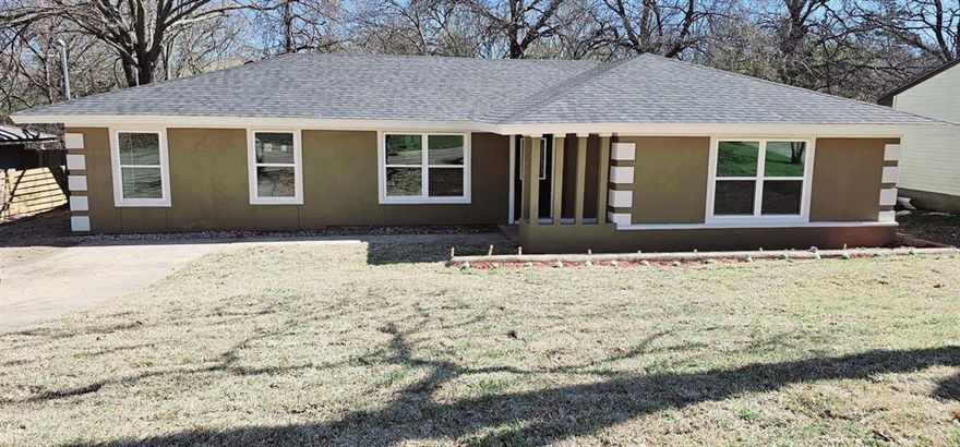 Applications are non refundable. Pets case by case. Refrigerator is included with the rental property. However the landlord is not responsible for repair or replacement should it stop working or have any issues. Washer Dryer  can stay with the house for $100.00 a month. TOTAL REMODEL DOWN TO THE STUDS, NEW ROOF, NEW WINDOWS, NEW SHEETOCK, NEW WIRING, NEW PLUMBING, NEW INSULATION, OPEN CONCEPT, NEW TEXTURE & PAINT. NEW VINYL PLANK FLOORING, NEW CARPET, NEW DOORS & TRIM. LED LIGHTING, NEW CEILING FANS. This stunning 4 bedroom, 2 bath home was fully remodeled and has been used as a successful Airbnb and rental since then. It features a beautiful modern kitchen overlooking the spacious living area, creating the perfect open concept flow. Enjoy the large backyard with a gorgeous deck ideal for entertaining or relaxing outdoors. Conveniently located just minutes from the freeway and within walking distance to the elementary school. This home offers comfort, style and location all in one package. Don't miss the chance to live in this Beautiful Move In Ready Home.