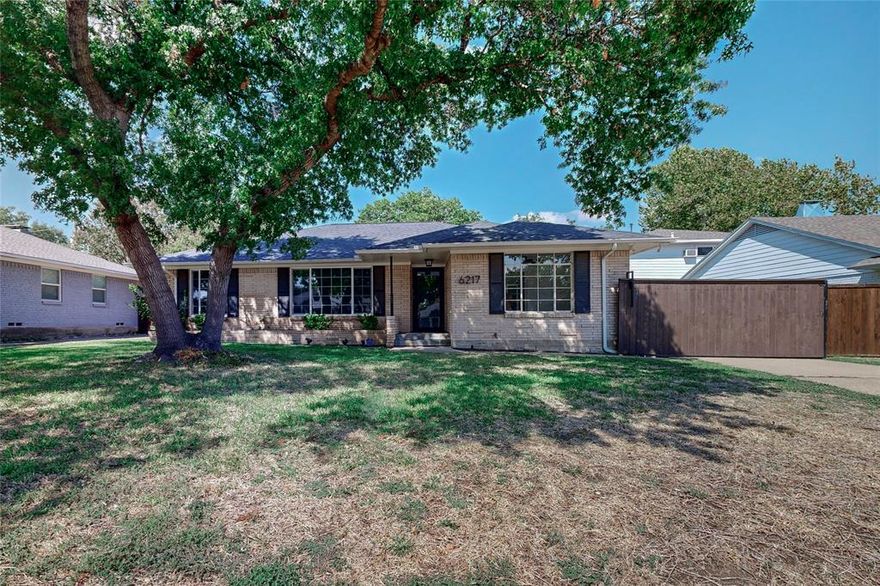 Wonderful ranch style home, on quarter acre tree shaded lot, with many updates. Property boasts wood floors through living areas, carpet in bedrooms, eat-in kitchen with granite counter tops, stainless steel appliances, gas range, new oak cabinets and tumbled marble backsplash. Fresh Neutral Paint Throughout, Ceiling Fans in Every Room, Crown Molding,  Two Living areas and a flowing floor plan. Convenient location to White Rock Lake, Central Market, North Park Mall, SMU and the numerous dining and shopping options along Greenville Ave. Energy conscious buyers will appreciate the new Windows, new smart HVAC system and improved attic insulation. Two closets in Master with Custom Shelving System. Slate covered Front Porch w Ext Lighting. This Home has an oversized  and landscaped Backyard with Pecans and Red Oaks. Lots of recent improvements in the last several years: roof, carpet, paint, drain and supply lines, wood fence, sprinkler system and more!