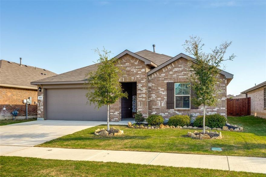 Welcome to this inviting 4-bedroom, 2-bathroom home nestled in the popular community of Liberty Trails Justin, just 6 miles west of Texas Motor Speedway and the tons of amenities at Tanger Outlet Center, multiple restaurants, medical facilities, churches and schools. Located in the acclaimed Northwest ISD, this property offers a bright, open floor plan designed for comfortable everyday living and relaxing. This lovely home is only 3 years old, has been painted in beautiful neutral colors, an upgrade from the builder paint. It has lovely landscaping and a large covered front porch. 
The spacious kitchen is a standout feature, complete with granite countertops, a large pantry, and abundant counter and cabinet space—perfect for meal prep, and entertaining. It features an expansive island so friends can visit while you prepare! It opens to the comfortable family room and dining area so it's easy for everyone to join in. The huge primary bedroom offers a relaxing retreat with a generous walk-in closet and large master ensuite bath.It's split from the other 3 bedrooms and second bath..Step outside to a big backyard with a covered patio, ideal for outdoor dining, playtime, or simply unwinding in your own private space. The community enhances the lifestyle with a refreshing pool, playground, scenic pond, and walking trails. You can move right in and join this family-friendly neighborhood.