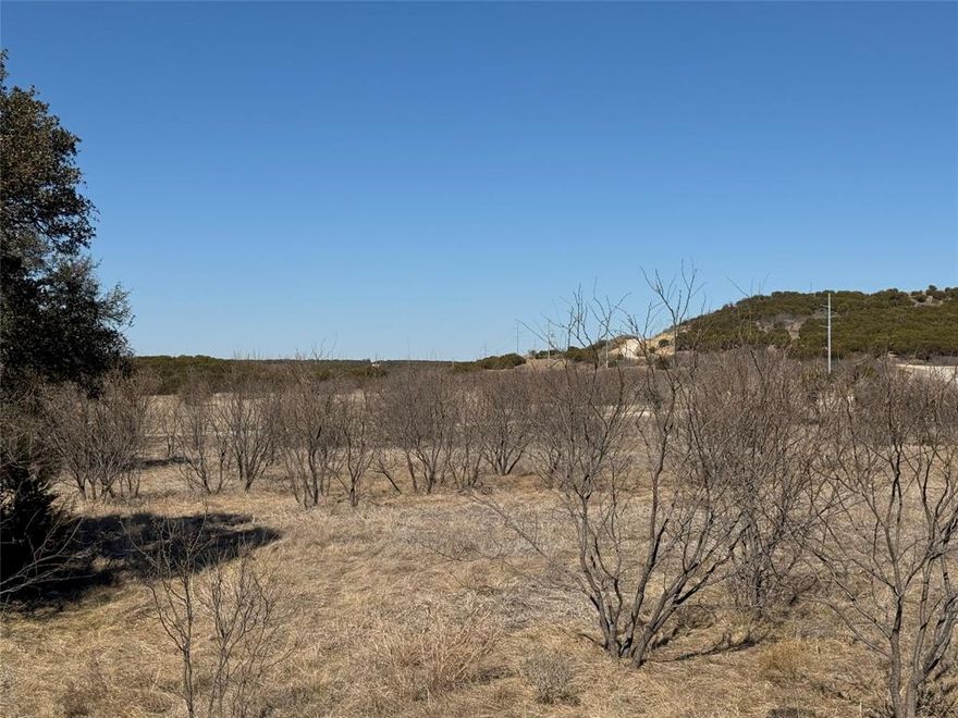 Nice, level, nearly 5 acre build site in a Tranquil setting. Easy access to all of the amenities The Hills Above Possum Kingdom has to offer including Watercraft launch, clubhouse and courtesy dock just up the road. Enjoy the expansive, zero edge community pool with gorgeous lake views. 2000 square foot minimum build. Choose your own builder. No rush to build.