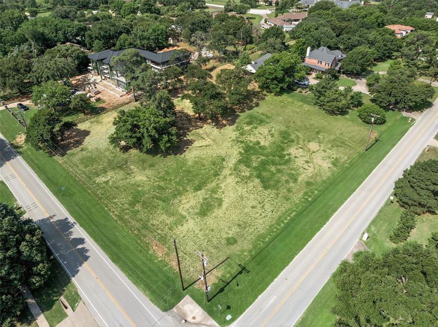 A rare find, this lot allows you to BRING YOUR OWN BUILDER and create a custom home in a prime location.  This 1.2 acre parcel offers a unique opportunity to build your dream home in the highly sought-after Carroll ISD. Once a horse pasture, the land boasts mature trees and a spacious layout, providing both charm and privacy. Conveniently located just minutes from shopping, DFW Airport, and Grapevine Lake, this property combines tranquility with accessibility. Don’t miss this chance—schedule a visit today!