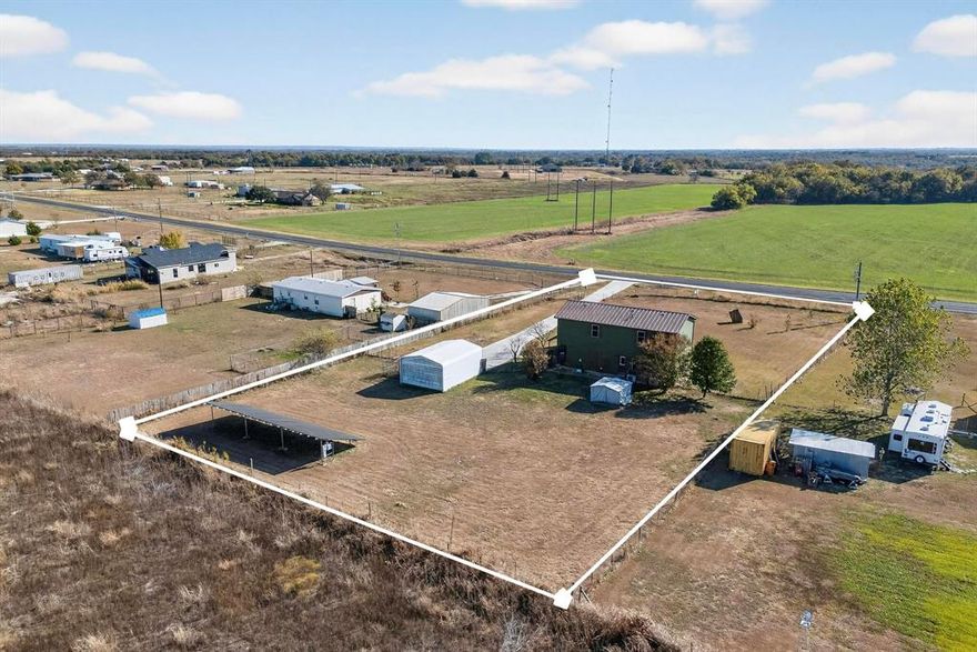 Welcome to country living with modern updates at this move-in ready 3 bedroom, 2.5 bath home on 1 acre in Alvarado ISD. USDA Approved 

Since purchasing in 2019, the owner has transformed this 2-story doublewide: upgraded from vinyl to NEW SmartBoard (Hardie-type) siding, installed a NEW metal roof, NEW 60 foot concrete driveway and 10X20 Concrete pad for storage building or gym. NEW  carport, NEW solar panels, NEW window treatments and a NEW Trex front porch. Inside you’ll find upgraded subfloor with durable limestone core luxury  vinyl flooring, an upgraded kitchen with quartz countertops, NEW cabinets and NEW plumbing, plus an upgraded NEW heat pump and NEW water heater. The primary suite features a spa like NEW shower with large LED mirror and modern finishes. Outside offers space for multiple storage buildings, fenced yard and plenty of space for pets, gardening or projects. Convenient access to major roads, yet with a peaceful rural feel—ready for its next owner.

**New Buyer will need to assume loan on solar panels , payments are approximately $300 monthly and generate surplus energy. **
** Storage Shed on stand alone pad will not convey with property **