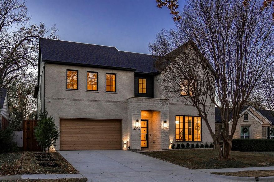 New construction home conveniently located in Mockingbird Elementary. Soaring 11' ceilings and smooth museum finished walls with designer art and entry lighting beckon you into this stunner. The expansive study at the front of the home showcases coffered ceilings and a large walk-in storage providing the flexibility to easily transform into a second downstairs bedroom or an additional living area. The gourmet kitchen is a chef’s dream, featuring stunning white oak cabinetry, Taj Mahal quartzite countertops, Sub-Zero and Bertazzoni appliances, and Brizo fixtures. The living area boasts arched built-ins, a beautifully designed wet bar, and a custom marble fireplace surround. The vaulted dining area adds a sense of formality to a space that effortlessly accommodates both everyday meals and formal dining occasions. An inviting outdoor living space, complete with a fireplace and grill, seamlessly extends the indoor living room and the spacious backyard offers plenty of room for a pool. The second floor offers a spacious game room with an alcove ideal for built-ins or workouts. Each of the secondary bedrooms include an ensuite for added privacy. The expansive primary suite has a closet that's truly envy-inducing and the primary bath is elegantly designed with fluted white oak cabinetry and marble countertops. The builder invested significant time and attention not only in the visible high-end finishes but also in the unseen, high-quality construction components including turnkey camera system, smart access and surround sound wiring, 2x6 framing and spray foam insulation, Anderson windows and Trane HVAC systems keeps you comfortable all year long.