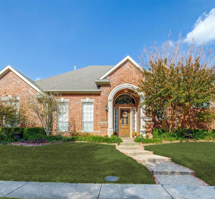 Beautiful, original owner, home in the desirable guard-gated Oak Tree enclave in Far North Dallas and one of only 5 homes in the community backing to the greenbelt. The majority of this 4 bedroom, 3 bath, 2 half bath home is on one level offering the convenience of the primary down. Generous entryway opens to combined formal living and dining with soaring 12' ceilings, crown molding and plantation shutters. Large family room affords easy entertaining with wet bar and fireplace, and is surrounded with windows letting in ample natural light with views to the pool and lush landscape beyond. Large eat-in kitchen includes stainless steel appliances with double oven and built in microwave. Utility room off the kitchen includes sink and storage and leads to a three car garage. All 4 bedrooms are down; one secondary with ensuite bath and two secondaries joined by Jack and Jill bath. Split floor plan allows privacy for spacious primary including a fireplace and large ensuite bath and walk-in closet. One bonus room upstairs provides space for more living or game room with additional half bath. Backyard oasis includes a pool, spa and outdoor kitchen with built-in grill and expansive views of the greenbelt.