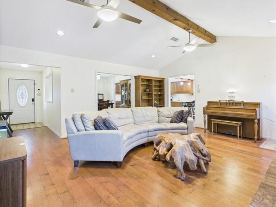 With a fresh new price, this exceptional waterfront retreat at 102 Misty Glen Circle is now an even more compelling opportunity to own in one of the most sought-after communities on Cedar Creek Lake. Nestled among million-dollar homes and spanning two spacious lots, the property blends luxury, comfort, and natural charm in a way that immediately feels like “home.” From the moment you arrive, you’re greeted by mature shade trees, peaceful partial water views, and a tranquil koi pond right at your doorstep. Inside the main residence, you’ll find four generously sized bedrooms plus a dedicated office, a formal dining room ideal for hosting, and a bright sunroom perfect for year-round relaxation. Recent thoughtful updates include granite countertops, stainless appliances, newer windows, and a high-efficiency Trane AC. For added peace of mind, there’s even a built-in indoor tornado shelter. Step outside to your private slice of lake life: a large boat dock with electric lift and approximately 4 feet of water depth—your gateway to easy weekends on the water. Storage is abundant with a 600-sf workshop, multiple storage buildings, a 2-car carport, and space for a large RV. A standout feature is the fully equipped guest house, previously used as a successful vacation rental. Whether for guests, multigenerational living, or continued rental income, it adds tremendous flexibility. Most furnishings in both homes are negotiable for a seamless transition into lake living or weekend escapes. Located in beloved Mantle Manors, owners enjoy access to a private park with boat launch, fishing pier, and party pavilion, all for just $125 per year. With the new price making this rare waterfront package even more attractive, now is the moment to explore a home that offers space, comfort, and the peaceful lakeside lifestyle you’ve been dreaming!