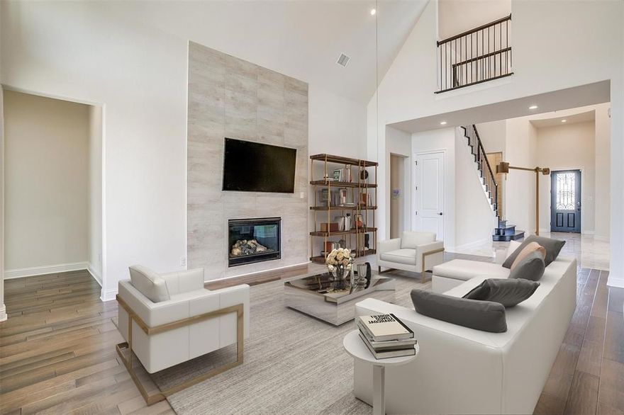 Welcome this stunning Mediterranean-style residence situated on a prime corner lot in Walsh. This luxurious home features nearly $300,000 in high-end upgrades and offers over 3,800 square feet of thoughtfully designed living space. With 4 spacious bedrooms, 4.5 bathrooms, and multiple entertainment areas, this home perfectly balances elegance and functionality.  The gourmet kitchen is a chef’s dream, boasting a quartz waterfall island, Sub-Zero built-in refrigerator, Jenn-Air range, double ovens, and a warming drawer. It opens seamlessly to the expansive living area, highlighted by a dramatic floor-to-ceiling fireplace and a unique sunken wine room—ideal for entertaining.  The main level includes a spacious primary suite with a spa-like ensuite bath featuring separate vanities, a walk-in shower, freestanding soaking tub, and an oversized walk-in closet. Also on the first floor are a guest suite, formal dining room, and a dedicated home office.  Upstairs, enjoy two additional bedrooms with en-suite baths, a game room with a wine fridge and wet bar, and a media room equipped with an 85-inch TV and built-in speaker system. The covered back patio is plumbed for a full outdoor kitchen with water and gas connections, offering endless potential for outdoor living.  This meticulously upgraded home offers luxury, comfort, and style. A must-see for buyers seeking a move-in-ready retreat with exceptional amenities.