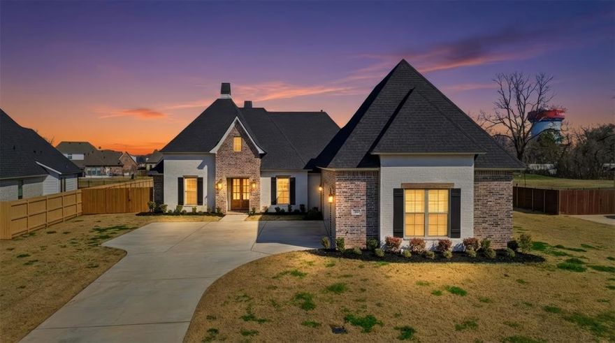 STATEMENT WORTHY HOME IN SOUTH BOSSIER! Prepare to fall in love with this stunning 2022 custom built home in The Preserve. Nestled on a spacious lot overlooking the gorgeous neighborhood pond, this home is sure to check all the boxes on your wish list! 268 Cullom Drive was built by Sollevare Homes and features 4 bedrooms, 4 bathrooms, 2998 square feet, a study or playroom, and a 3-car garage. Driving up you're greeted by grand curb appeal with a mix of classic and painted brick and double wooden doors. Step inside to find a large open concept living, kitchen, and dining space with an abundance of natural light and windows overlooking the backyard and pond. The living room has built-in bookcases, a gas starter fireplace, and engineered white oak wood floors that flow beautifully through the home. Off the living room is an office or playroom space with double glass doors. The kitchen is showpiece with a large center island, dolomite countertops, custom cabinetry, a coffee or wine bar area, and a eat-in kitchen space ready to entertain friends and family. The primary suite is remote and has a dreamy ensuite bathroom complete with separate vanities, a walk-in shower with 2 shower heads, a garden tub, and an oversized closet with built-ins. Off the kitchen is a hallway with the walk-in pantry, laundry room with a sink and cabinets, a bedroom, a full bath, and mud bench area with cabinets. Upstairs is bedroom four or a bonus room, a full bathroom, and access to the walk-in attic. Outside enjoy a covered patio with a fireplace, fully fenced in yard, beautiful pond views, and plenty of room for outdoor activities. Additionally, the home has a full sprinkler system, a hard-wired security system, and zero carpet throughout. The Preserve has 2 entrances with one off of Arthur Ray Teague Pkwy, a playground, a park, community events, and only 10 minutes to Barksdale Air Force Base. Easy commute to East Bank District and Shreveport shopping and dining. Don't miss this beauty!