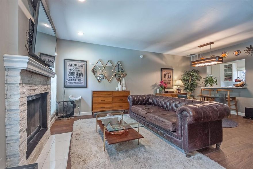 If you desire convenient stress free living this home is for you. Located in a unique 15 unit condominium community with assigned covered parking within minutes of Baylor Hospital and downtown Dallas. All within walking distance to shopping, restaurants, Whole Foods and more. Completely updated kitchen with breakfast bar off dining area includes Kitchen Aid appliances, custom soft close cabinets, granite countertops with under sink water filter and separate pantry. Custom window shades throughout the home compliment each room. Uniquely clever use of maximizing space throughout starting with the washer dryer closet abutting an oversized storage closet. Private fenced patio off the kitchen offers  stamped concrete for grilling year round. You'll notice the soaring ceiling above the extra wide spiral staircase allowing for full natural light. Unique landing offers large walls to feature your favorite art pieces. To the left is the primary bedroom with custom sliding closet doors featuring a lux Elfa system for maximum use of space. To the right is the secondary bedroom which is perfect for an office if desired. There is a large updated full bath between rooms upstairs along with a half bath downstairs for guests. Condo has Eco Bee smart thermostats for complete comfort, removable stair platform for convenience when needed, ceramic tile for easy living. NOTE parking is gated at both entrances for security. Enjoy a short walk to historic Swiss Avenue for evening strolls or morning jogs. This adorable condo offers you convenient proximity to downtown Dallas avoiding major highway commute. Comparable properties in the area are difficult to find in this price point with the updates and care this condo offers.