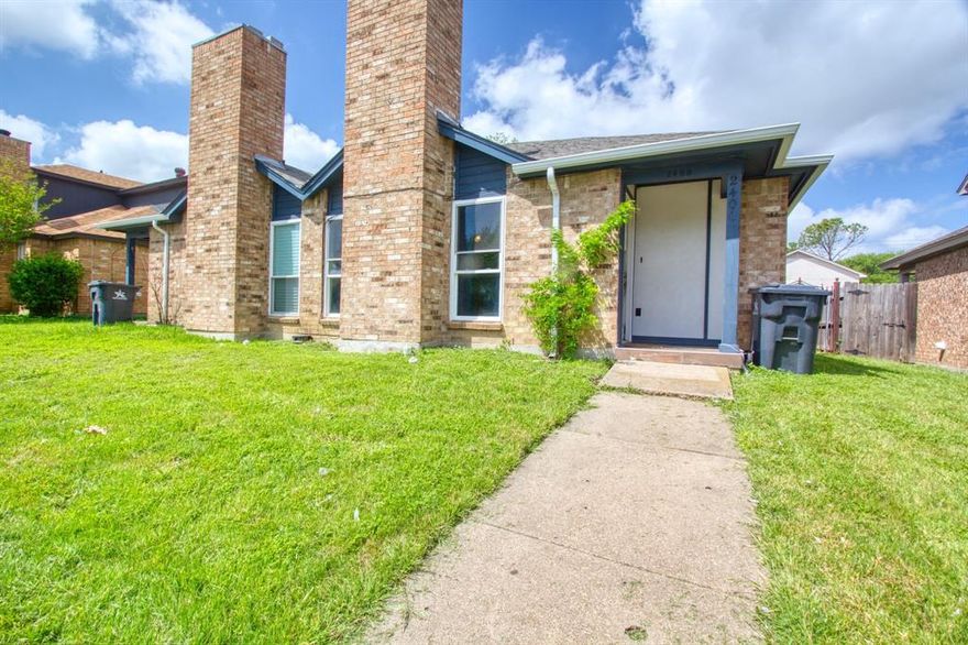 Lovely duplex style home conveniently located in the heart of DFW.  Updated HVAC unit, windows, texture, paint & gutters. No popcorn or carpet inside. Brick fireplace overlooks open living and dining. Galley kitchen, utility room off the kitchen. Plenty of natural light in the master bedroom which has a large closet, open vanity and private bathroom. Small covered patio with side yard that leads to storage closet and rear carport parking. Low maintenance living with convenient access to 360, 30 and 20. Enjoy Cowboys, Rangers, Six Flags and many dining & shopping options that Arlington has to offer!