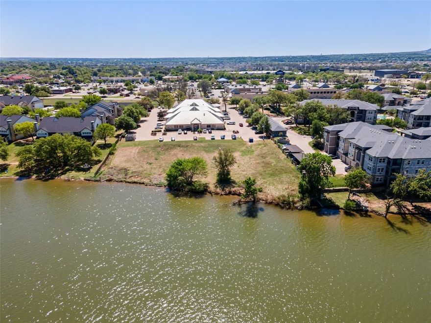 Located on the prime main body of the lake, this exceptional 1.5-acre lot presents a rare and valuable opportunity for development. With 43 designated parking spaces already in place, this property is ready to accommodate a variety of commercial, residential, or mixed-use projects. The expansive, scenic waterfront location offers stunning views and ample space for future development, making it ideal for resort-style developments, a restaurant, a marina, or luxury waterfront condos. The lot provides easy access to major roads and is conveniently situated near local amenities, offering both privacy and accessibility. Whether you're looking to create a vibrant waterfront destination or capitalize on the booming demand for lakefront properties, this property is perfectly positioned to turn your vision into reality. Take advantage of this prime development opportunity in one of the most desirable locations on the lake. The potential is limitless.
