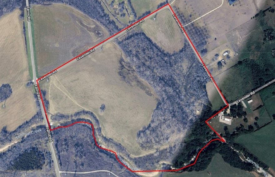 Beautiful 63.874-acre tract located in Ferris, Dallas County, offering outstanding potential for commercial, agricultural, or investment use. This expansive property is currently utilized for agriculture and features open, attractive terrain with wide views and gently rolling land. With commercial zoning already in place, the tract is ideal for development such as industrial, retail, warehouse, logistics, or continued agricultural operations. The property provides exceptional access and visibility with an impressive 2,500 feet of combined road frontage along Ferris Road and Lavender Road, allowing multiple entry points and flexible site planning. An electric easement along the road provides convenient access to utilities, reducing development time and cost. Located just minutes from IH-45, the property offers quick connectivity to Dallas, Ennis, and surrounding communities. It is also positioned near the proposed Loop 9, a future transportation corridor expected to significantly enhance mobility and promote long-term area growth. This places the property in a prime location for future expansion and appreciation. With its combination of size, zoning, visibility, and strategic location, this land is ideal for developers, investors, or agricultural users seeking high-value acreage in a rapidly growing corridor. Whether you are looking to build now or hold for future opportunities, this Ferris property offers a rare chance to secure nearly 64 acres in one of the most active regions of southern Dallas County.