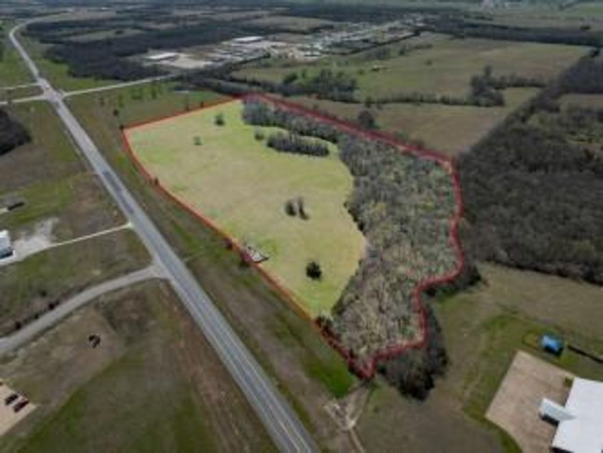 Prime 17.989 acres (±) undeveloped property is located off Highway 82 in the heart of Red River County. This parcel sits outside city limits with approximately 1000 ft of highway 82 road frontage. Featuring high visibility with an AADT 4,336 traveling loop 82 daily. The land is mostly flat with some wooded areas, and a creek running along North and the back end, perfect for development use. A must grab for investors!! Take advantage of this exceptional commercial development opportunity today and turn this prime property into your next big business venture! Located 1.5 miles from downtown Clarksville, 45 minutes from Texarkana, and 2 hours from Dallas. Additional acreage is available. The property is available for subdivision, with the condition that divisions extend to the property lines.

The North 7.011 acres closest to the church have sold. See picture for reference.