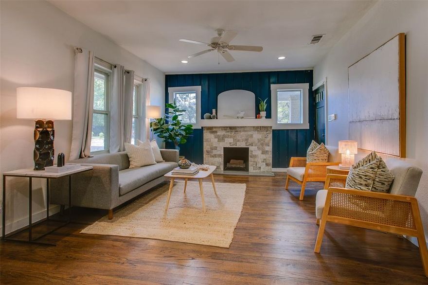 A home as charming as this one is hard to come by. Tucked away in the heart of Kessler Plaza, this beautifully remodeled bungalow strikes the perfect balance of historic character and modern sophistication. From the moment you step inside, you’re greeted with gleaming hardwood floors, thoughtful updates, and a seamless, open layout that invites you to linger.

The living room is anchored by a striking accent wall and updated fireplace that effortlessly set the tone for the rest of the home. Flowing naturally into the dining and kitchen areas, you’ll find a crisp white color palette complemented by quartz countertops, stainless steel appliances, and an abundance of cabinetry bathed in soft natural light. Just beyond, a flexible bonus space overlooking the backyard makes the ideal home office, studio, or reading nook.

Each bedroom is generous in size, with the primary suite featuring a walk-in closet and spa-like bath complete with bold patterned tile, double vanities, and statement mirrors. Outside, the spacious fenced yard provides endless possibilities, whether it’s hosting under the trees, planting a garden, or expanding your outdoor living.

Perfectly positioned near Bishop Arts, Kiest Park, and Stevens Park Golf Course, this gem delivers the best of Oak Cliff living, offering style, comfort, and a sense of home you’ll feel the moment you walk through the door.