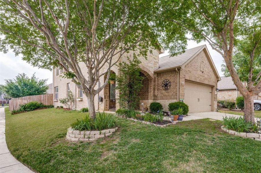 Welcome to this beautifully maintained 4 bedroom, 2.5 bath home with a 2 car garage, nestled in the highly desirable Villages of Woodland Springs Neighborhood and zoned to acclaimed Northwest ISD, with the new high school within walking distance. Located on a corner lot with generous parking. Thoughtfully designed with functionality and comfort in mind, with an open-concept layout. Upon entry, you are greeted by warm wood floors and a nice-sized half bath and closet. The living room features barn doors, crown molding, and custom shelving. The open-concept living area flows seamlessly into the kitchen, featuring additional crown molding, granite countertops, a custom island that matches the cabinetry, custom corner shelving in the dining area, and all-electric appliances. The primary suite is tucked away just off the kitchen, located in the back of the home on the 1st floor, and offers a relaxing escape. The crown molding continues in the bed and bathroom. It offers a garden tub with a separate shower,  a custom cabinet above the toilet, and additional shelving and hanging space in the generous primary walk in closet. Outside the primary, a large linen closet. A well-positioned utility room, complete with a custom counter for folding, and an additional hanging rod that extends the length of the room for those line-dry items. Also located outside of the utility room is an additional linen closet. The upstairs has a nice-sized game room with three bedrooms just off that area. The bathroom has been updated with a shower glass installed. One bedroom has wood flooring, and the other two are carpeted. The house has fresh paint throughout the inside in neutral colors.  Enjoy a 10x10 patio with room to expand,  and a nice-sized backyard with charming landscaping. This property is located in a vibrant community offering 6 pools, a playground, several catch and release ponds, miles of scenic bike and jogging trails, volleyball courts, and a tennis-pickleball court