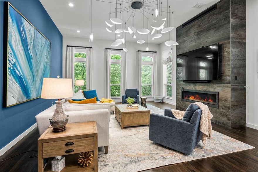 This beautifully finished home is in the heart of Dallas’ vibrant State Thomas neighborhood, just steps from Griggs Park and minutes from the city’s best dining, culture, and nightlife. This thoughtfully designed residence blends elevated style with city convenience, offering an ideal blend of luxury and location. It features high-end, designer finishes throughout, including rich wood flooring, curated lighting, and sleek architectural details. The versatile main level features a clean-lined kitchen with professional series Monogram appliances, marble counters and backsplash, oversized island & custom cabinetry, including a hidden pantry. The dining area is highlighted by a stone fireplace flanked by two climate-controlled wine storage areas for over 400 bottles of your favorite wines. All three bedrooms have en-suite baths. The floor-to-ceiling windows flood the open living spaces with natural light, while the split-bedroom layout ensures privacy and flexibility for guests, roommates, or a home office setup. Tucked into a walkable, tree-lined neighborhood with a strong sense of community, this property offers direct access to downtown without sacrificing comfort or charm. Whether you’re enjoying a peaceful morning walk through the park or entertaining friends before a night out in Uptown, this property offers an urban lifestyle that’s both refined and effortlessly livable. No HOA.