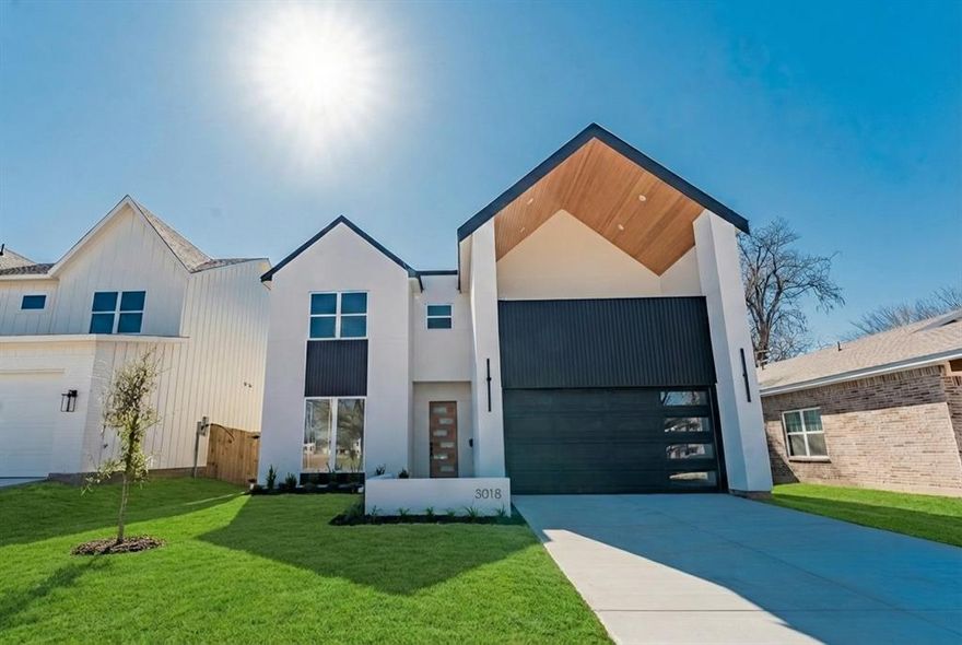 Ideally located just minutes from the vibrant heart of Dallas, this architecturally striking 4-bedroom, 3-bath residence delivers elevated design, refined finishes, and exceptional functionality.
Step inside to soaring double-height ceilings in the living room and kitchen, creating a dramatic yet inviting atmosphere filled with natural light. The open-concept layout is thoughtfully designed for upscale entertaining and effortless everyday living.
A versatile designated office or guest bedroom provides the flexibility today’s lifestyle demands — perfect for remote work, visiting guests, or a private retreat.
Designer-selected finishes elevate every detail throughout the home, complemented by premium luxury vinyl flooring that offers both sophistication and durability. The statement staircase with integrated LED lighting adds a bold, contemporary focal point.
Spacious bedrooms and spa-inspired bathrooms create a serene living experience, blending comfort with modern elegance.
Enjoy luxury living with the convenience of being just 10 minutes from Downtown Dallas — dining, entertainment, business districts, and nightlife are all within easy reach.