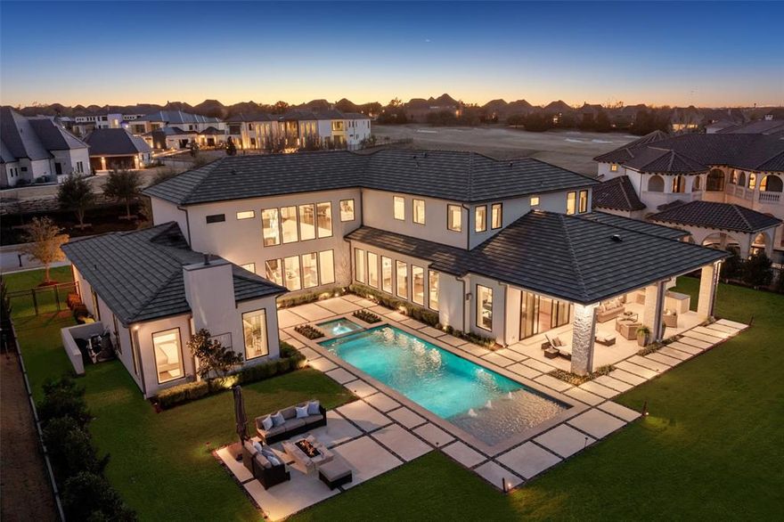 Price improvement AND seller offering $20,000 buyer incentive paid at closing w accepted contract prior to April 30th, 2026.An incredible opportunity to own in the prestigious guard gated community of Wimberly Place, the only gated luxury community in Allen. A true custom offering with unique privacy and top-of-the-line construction throughout on a premier Twin Creeks golf course lot. This newer construction estate maximizes its footprint while leaving plenty of grass for entertaining and outdoor enjoyment. The home reflects today’s most desirable design trends and timeless appeal, blending transitional and modern accents. Enter through tall French iron doors into a light-filled interior where floor-to-ceiling glass showcases the resort-style pool and outdoor living areas, perfect for rest and relaxation. Chalky white museum-smooth walls and wide-plank white oak floors create a gallery-like backdrop for art and beautiful everyday living. The open kitchen, breakfast area, and family room connect seamlessly with a large walk-in bar, theater, and butler’s pantry- ideal for hosting or quiet nights in. The oversized primary suite offers a private retreat with spa-like ensuite bath and enormous closet, while a separate junior primary in-law suite sits on the opposite wing for privacy. Upstairs, a spacious lounge and game area connect to three well-appointed ensuite bedrooms, a secondary laundry room, creating an ideal layout for modern living. Built with extraordinary attention to detail and structural integrity by the sellers, including over 100 piers, foam insulation, concrete tile roof, imported stone flooring, select white oak floors, level 4 countertops, Wolf-SubZero appliances, built-in Miele coffee maker, two dishwashers, designer lighting, and tankless water heaters. Priced below recent sales and ready for immediate occupancy. An exceptional opportunity to own in highly regarded Allen ISD and the golf community of Twin Creeks with easy access to all major roads.