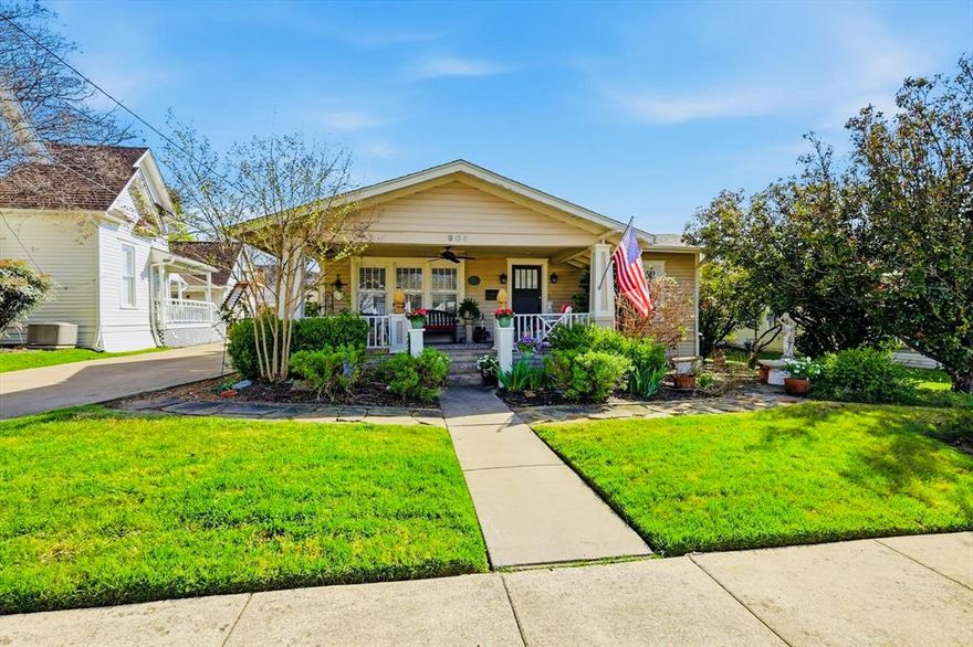 Rare opportunity to own a charming 1930 Craftsman bungalow on prestigious Tucker Street, less than one mile from the Historic McKinney Square.

Nestled in the heart of McKinney’s beloved Historic District, this charming home captures the timeless character that makes this neighborhood so special, while offering a rare blend of historic charm, thoughtful updates, and an inviting, walkable lifestyle.

Surrounded by lush, mature landscaping cultivated over years of care, the home welcomes you with a classic front porch—an ideal place to relax and enjoy long summer evenings with friends and neighbors.

Inside, 905 Tucker Street offers 3 bedrooms, 2 full baths, and 1,938 square feet of comfortable single-level living. The spacious living room showcases original hardwood floors that flow seamlessly into the dining area and kitchen, creating a warm and inviting layout perfect for everyday living and entertaining.

The updated kitchen honors the home’s 1930s character while providing modern functionality, featuring updated appliances, a gas range, and a farmhouse sink. Large windows throughout fill the home with abundant natural light, enhancing the warmth and charm of each space.

The primary suite features an updated bathroom with a spacious walk-in shower, while the secondary full bath retains the home’s historic character with a classic clawfoot tub—offering the perfect blend of modern comfort and vintage appeal.

Step outside to the expansive backyard deck, perfect for evening dinners and gatherings under the Texas sky. From here, enjoy the unique lifestyle of McKinney’s Historic District, with boutique shopping, local restaurants, coffee shops, and community events just a short stroll away on the Historic Downtown Square.

New roof installed March 2026. Driveway is shared along with storage building at the end of the driveway. 3rd bedroom is currently being used as second living area & office