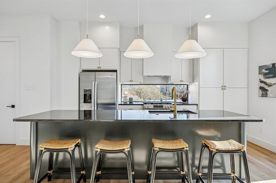 Welcome to 2147 & 2151 Mail Avenue, a brand-new collection of modern three-story condos designed with both style and functionality in mind. The first level features a versatile flex room with a closet, perfect for a home office, lounge, or guest space. The second floor opens to an expansive living area filled with natural light, highlighted by high ceilings and a seamless open-concept layout. The kitchen serves as the centerpiece of the home, featuring custom cabinetry, an oversized island, and access to a private balcony—ideal for both entertaining and everyday living. The third floor features the home’s bedrooms, including the spacious primary suite with a double vanity, walk-in closet, and oversized walk-in shower. Thoughtful design, modern finishes, and a well-planned layout come together to create a comfortable and stylish home in Dallas.