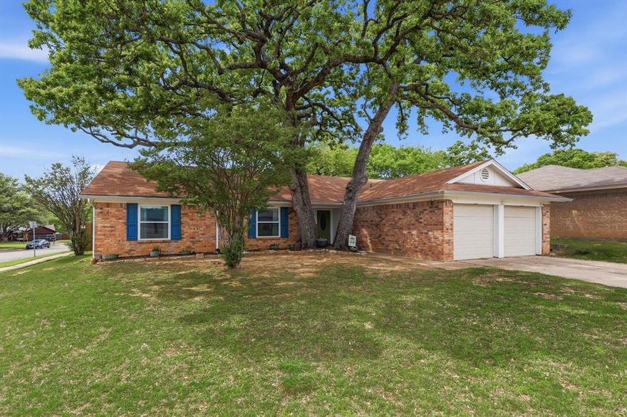 WELCOME HOME!! Tucked on a spacious corner lot in Bedford, this updated 3-bedroom, 2-bath home offers a warm, inviting feel from the moment you step inside. The oversized living area and masonry fireplace is truly the heart of the home—open, comfortable, and filled with natural light thanks to brand new windows that make a noticeable difference. Updated flooring runs throughout, creating a clean, cohesive look that’s both modern and easy to maintain. The layout flows effortlessly, making everyday living and entertaining feel natural and functional. Each bedroom offers a comfortable retreat, while the overall layout provides flexibility for a variety of lifestyles. Whether you’re hosting friends or enjoying a quiet evening at home, the space just works. Outside, the large corner lot gives you room to spread out—ideal for pets, play, or simply enjoying a little extra breathing room. It’s a rare combination of space, light, and thoughtful updates, all in a convenient Bedford location close to shopping, dining, and major thoroughfares.