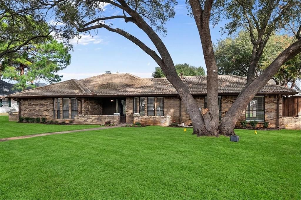 Photo of 2306 Sunnyvale Road, Grand Prairie, TX 75050 (MLS # 21206213)