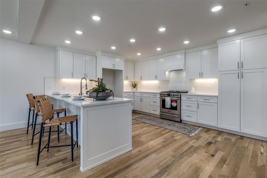 Introducing a stunning new construction in the heart of East Dallas that effortlessly blends energy efficiency with modern luxury and unbeatable location. This thoughtfully designed home features a private rooftop patio with panoramic skyline views, premium energy-efficient windows, and an upper-level entertainment space complete with a sleek wet bar—perfect for hosting guests or relaxing under the stars. Step inside to an inviting open-concept layout where crisp white cabinetry, elegant white quartz countertops, and top-of-the-line stainless steel appliances make the kitchen a true showpiece. White oak hardwood floors and a soft, neutral color palette create a warm and welcoming ambiance throughout. The serene master suite is a true retreat, featuring large windows, a cozy sitting area, and a Juliet balcony that brings in natural light and fresh air. The spa-inspired master bath is equally impressive, with custom dual vanities and a luxurious multifunction shower system. Ascend to the fourth floor and discover a dedicated entertainment lounge complete with a wet bar and access to a rooftop terrace with breathtaking views of the Dallas skyline—ideal for both indoor and outdoor entertaining. Located just minutes from Dallas’ top dining, shopping, and entertainment hotspots, this home offers the perfect balance of style, function, and location. 9 units available—call now for portfolio pricing.