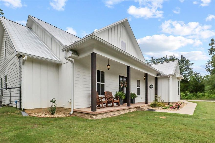 Resort-Style Private Living on Nearly 5 Acres in Lindale ISD- Immaculate 4 bed, 3 bath oasis you HAVE to see in person to truly feel how stunning, peaceful, and meticulously cared for it is. Built in 2018, this 2, 684 sq ft property features high ceilings, an open-concept layout, gourmet kitchen with premium appliances, and a luxurious primary suite with spa-style bath and huge closet. Enjoy complete privacy and outdoor living with a stunning recently installed in-ground HEATED pool and spa, covered patio, and fenced backyard, perfect for entertaining. Energy-efficient upgrades include spray foam insulation, Generac 18kW whole-home generator, and 500-gallon propane tank. Includes a 20x30 spray-foam insulated shop, plumbed for potential guest quarters or bathroom- INCOME POTENTIAL. BONUS FEATURES: storm shelter, chicken coop, tree stand, and a wet weather creek. Also comes with a recently purchased zero-turn mower and large safe. Minutes from downtown Lindale and Tyler. Don’t miss this luxury move-in ready home with space to live, grow, and enjoy!