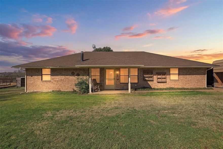 Take a look at this convenient small acreage horse property near Stephenville, TX! Only 5 minutes to the edge of town, on a paved road. You will love the roomy 3 bedrooms, 3 full bathroom home with a laundry room, pantry, granite countertops, kitchen island and a nice wood burning stove for those cold winter nights. The main on suite is large for maximal comfort and privacy and includes a nice walk-in closet. There is a second on suite that could be perfect for an in-law, an older child or simply for great accommodations for your guests. Step outside and enjoy the weather under the covered patio wired for entertainment (TV). The horse facility includes a 6-horse walker, a 5-stall shedrow barn with runs, a roping arena with lights, round pen, wash area, storage building and a 3 acre pasture. You will also find a good amount of new pipe and no-climb fencing that was added in 2021, a hay barn that can also serve as tackroom and feed room and 3 big carports to protect your valuables. Next to the long (paved) Carport is a RV hookup where you can keep your living quarter going or have somewhere nice for your visitors to plug-in.