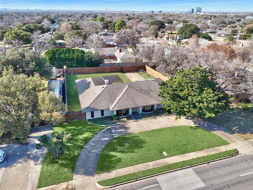 COMPLETELY REMODELED 1-STORY RANCH STYLE HOUSE WITH 4 BEDROOMS, 3 BATHROOM, ON OVER ONE THIRD ACRE, WITH CIRCULAR FROM DRIVE + SEPARATE MOTORIZED GATED BACK ENTRANCE.Inside you’ll find Decorative Tile Entry Foyer and Hardwood Flooring Throughout the rest of the house. Once you pass by the Formal Dining Area and Formal Sitting Area or Office, you enter the Living Room with an Accent Fireplace with Large Hearth, Windows overlooking the Backyard, and Views of the gorgeous dream Kitchen equipped with Taj Mahal Quartzite Countertops, Single Basin Porcelain Farm Sink, All THOR Stainless Steel Appliances including 6-Burner Professional Cooktop with Griddle and Pot Filler, Double Oven, Under Counter Microwave, 3rd Convection Oven, Dishwasher, Side by Side Refrigerator, 42 Inch Cabinets with Under Cabinet Lighting, Glass Front - Lit inside Cabinets, Breakfast Bar, and Full Wet Bar with Ice Maker. Down one hall you have Suite-style Bedroom with Ensuite Bathroom, Oversized Laundry Room with Dog Washer, and Access to the Garage. On the other side of the house, you have ½ Bathroom, 2 Bedrooms Connected with a Bathroom, and Primary Bedroom containing Double Vanity, Double Shower with Rain Showerhead, Clawfoot Garden Tub and more. Newer HVAC, New Windows, Board on Board Horizontal Fence, Pergola and Extended Patio, Outdoor Kitchen, and More. This house has it all. Easy access to major roads including Dallas North tollway. Easy to show - Video and 3D Tour are available online.