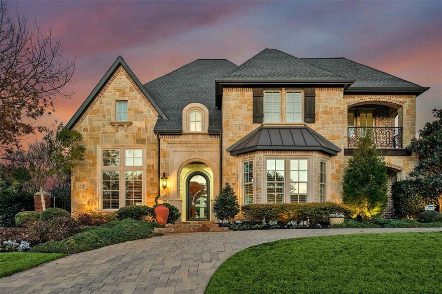 Multiple Offers Received.  Highest Best due by Monday, 5-19 at 5PM. Action-Packed Outdoor Living! Summer is here and this home is perfect for entertaining and relaxing. Enjoy two covered areas with a fireplace and outdoor kitchen. Sparkling pool with spa, waterfalls, tanning ledge and in-pool table seating. You may plan to staycation! Step inside this Peter Drais Custom Home to find expansive, open living spaces and high ceilings. The heart of the home features an impressive great room with pool views, soaring stone fireplace and built-in bar with Sub Zero wine tower and beverage drawers. The open concept gourmet kitchen is equipped with high-end appliances, warming drawer and built-in Wolf coffee maker. Two spacious walk-in pantries. The large quartzite island is perfect for entertaining and family gatherings. The private owner’s suite features pool views, spa bath and a California Closet. First level guest bedroom connects to a flex space with private entry providing versatility for an in-home office or separate living quarters. Large upstairs game room and three ensuite bedrooms.  All secondary bathrooms recently updated. Media room with built-in bar. Huge walk-out attic for storage. Rare 4 car garage, circular drive. Gorgeous mature trees. Irresistible location, Frisco ISD and minutes from vibrant Legacy West and all the excitement surrounding North Dallas.