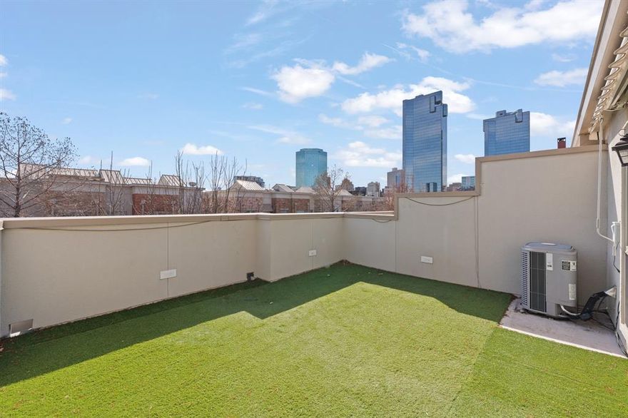 Live in the heart of it all with this stunning three-story townhome in Downtown Fort Worth, just moments from Sundance Square, dining, entertainment, and nightlife! The first floor welcomes you with a bright, open-concept layout featuring spacious living and dining areas, a stylish kitchen with granite countertops, stainless steel appliances, and a convenient half bath—perfect for entertaining. On the second floor, retreat to the private primary suite complete with a spa-like bath offering dual sinks, granite counters, a jetted garden tub, separate shower, and a large walk-in closet. The laundry room is also located on this level for everyday convenience. The third floor adds incredible flexibility with a secondary suite, plus a large gameroom ideal for a media space, office, or second living area. Step outside onto the rooftop patio and take in breathtaking views of Downtown Fort Worth and Sundance Square—the perfect backdrop for relaxing evenings or hosting friends. Urban living, modern comfort, and unbeatable views — this one truly has it all. Also includes fridge, washer, and dryer. Call for your private showing today of this downtown Fort Worth dream!
