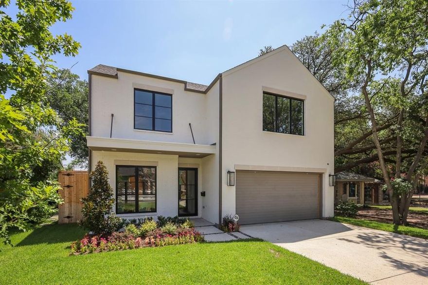 Experience modern luxury in one of Dallas’ most walkable neighborhoods. This newly built home blends clean design with warm, timeless finishes just steps from Inwood Village’s dining, boutiques, and daily conveniences.

An airy open layout welcomes you with 10-foot ceilings, white oak floors, and a striking wood and gas-burning fireplace anchoring the living area. The chef-inspired kitchen features quartz countertops, custom cabinetry, premium appliances, and a seamless flow for effortless entertaining.

Upstairs, all bedrooms include spacious layouts and private en-suite baths. The primary suite offers a peaceful retreat with a spa-like bath and generous closet space.

Outside, enjoy a rare private backyard shaded by a mature oak tree—an ideal setting for gatherings, play, or quiet mornings.

With unmatched walkability and quick access to the Dallas North Tollway, Love Field, and top-tier amenities, this home delivers modern comfort in a prime central location.