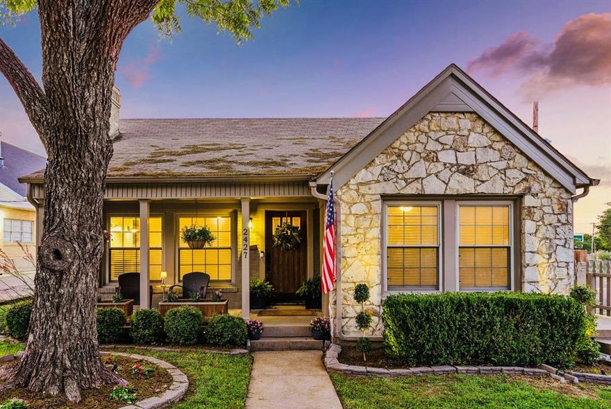 Welcome to this updated and timeless 1930s two bedroom cottage in Kessler Plaza. As you enter through the beautiful wood front door, you are immediately in the heart of the home. Hardwood floors flow throughout the house, creating a warmth and lure that makes a house a home. The traditional, eye-catching fireplace is the focal point of the large living room. The adjacent, roomy dining room is directly connected to the updated kitchen and is perfect for the chef who likes to entertain or for a quiet night in. The kitchen boasts floor-to-ceiling cabinets, a farm sink, open shelving, and stainless steel appliances. The elevated bathroom stands out with light and bright tile and classic hardware. Both of the generous sized bedrooms are big enough to fit king sized beds in addition to other furniture. The back laundry-utility-flex room that overlooks the spacious backyard would be a great nook for a small art space, craft room, reading room or work out space. You’ll find mostly new finishes, but the stunning, original door-handles, solid wood doors, unique arches, and classic architecture make this home special. These key design choices have stood the test of time.

Updates include: HVAC (2022), Rheem Tankless water heater (2025), upgraded electrical panel (2026), entire exterior paint (2025), interior paint (2026), new Siding (2025), roof (2018), roof repairs and Scotchguard coating (2026 - transferable warranty), Brazilian walnut hardwoods, quartz countertops, designer lighting, double pane windows.

Enjoy the breeze from your front porch as you sip your morning coffee or relax with a drink in the evenings as the sun sets. With quick access to Hampton and Jefferson, you’ll be minutes away from Dallas's best restaurants, shopping, entertainment and the arts.
Nestled under a majestic pecan tree, this South Dallas charmer is a blank slate and ready for a new owner's touch.