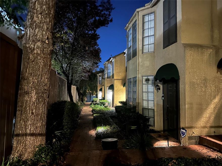 Fantastic two-bedroom, one-and-a-half-bath condo located adjacent to Cole Park. This condo is situated in a highly walkable neighborhood, offering a low-maintenance lifestyle close to the West Village restaurants and shops, Cole Park, the Katy Trail, and Trader Joe's. The functional floor plan features a spacious living room, kitchen, dining area, and an updated half bath on the first floor. A private covered patio with flagstone provides an excellent space for entertaining. Upstairs, the two generous bedrooms are perfect for roommates or for setting up a private home office. The unit includes engineered wood floors on the first floor and carpet on the stairs and second floor, with window treatments throughout. 
Additionally, you'll enjoy the convenience of two assigned parking spaces just a short distance from your door. This property offers an incredible opportunity to live in a vibrant area with all the modern comforts. The lease includes a refrigerator and stackable washer and dryer.