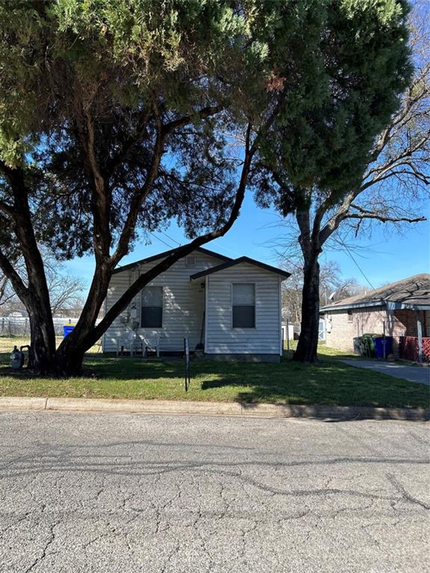 Adorable 1 bedroom, 1 bathroom home situated in White Settlement.  Located in an established neighborhood. Conveniently located near shopping, dining, schools, and close to Lockheed Martin.
White Settlement ISD is rated high with the State of Texas. White Settlement is a growing community with a lot of new construction in areas. This home is the home you have been waiting for - a tiny home on a big lot! Add a storage building, build a workshop, add a second living quarters, the possibilities are endless. Keep your overhead low while being so close to all major freeways, hospitals, shopping, schools and the endless entertainment that the Metroplex has to offer. Make this home your forever home, your first home or your downsize home. Dream it and make it happen! 
No survey available. Sold As-Is, seller will not make any repairs. All disclosures online.

Tenant occupied on a month to month basis and the tenant will need a 30 day notice to move out. Home is being managed by a professional management company which can continue on with the new buyer.