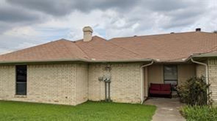 Charming duplex in NRH within the BISD district. This inviting 2 bedroom, 1.5 bath unit is conveniently located off Davis Blvd. It offers easy access with parking right behind your home. The kitchen is equipped with a stove and dishwasher.  A frig, washer and dryer can be provided at no cost.There is a handy washer and dryer closet adjacent to the kitchen. The dining area flows into a spacious, step-down living room featuring a cozy fireplace. The entire home boasts plank flooring free of carpet, providing a clean and modern feel. You will find plenty of storage with several closets inside and an additional one outside. Enjoy the privacy of a fenced back yard and rest easy knowing the home is all electric. This property is in close proximity to top schools and maintains a strict no smoking policy. Vouchers are not accepted. Prospective renters cannot have any negative rental in the past 5 years. Renters insurance is required.