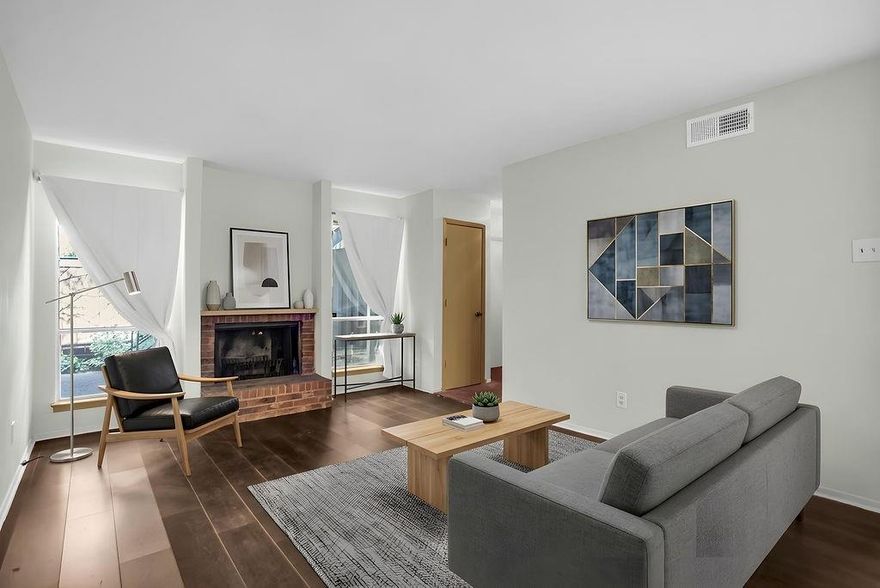 This spacious one-bedroom condo offers a newly painted neutral palette and an open living and dining area, perfect for modern living. The cozy brick wood-burning fireplace adds charm, while the galley-style kitchen is both functional and efficient. Ample storage throughout includes three large closets plus an additional coat closet. Enjoy newly updated flooring in the main living areas and stylish tile in the wet zones. The breaker panel has been recently replaced with a new, labeled system for added peace of mind. With low HOA fees and an assigned parking spot directly in front of the complex, convenience is at your doorstep. Step outside to your private, fenced patio — an ideal space to enjoy morning coffee, unwind in the evening, or simply relax in the fresh air. The bedroom features sliding glass doors that open to the patio, allowing natural light to fill the oversized room. 
Living in a small, friendly 22-unit community offers a sense of peace and privacy, complemented by beautifully manicured grounds and a gated courtyard entry. The location is unbeatable — just blocks from Whole Foods and within walking distance to an array of shops and restaurants. With easy access to downtown, Love Field, the Katy Trail, and major highways like DNT, I-35E, and Highway 75, this home provides ultimate convenience for your lifestyle.