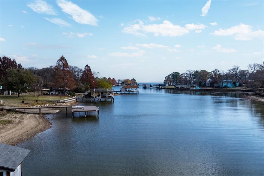 Motivated Seller - Bring All Offers! Priced Below Tax Value! Unique opportunity for price-conscientious buyers to own a Cedar Creek Lake waterfront property with 88 platted waterfront feet on good water in a good neighborhood with no manufactured homes AND with lots of potential. It has two bedrooms and two baths with an enclosed patio which could be converted to an additional bedroom or used as a second living area. This 'fixer upper' is in need of updating and has some deferred maintenance but is currently occupied. Take a look at this property - it won't last long!