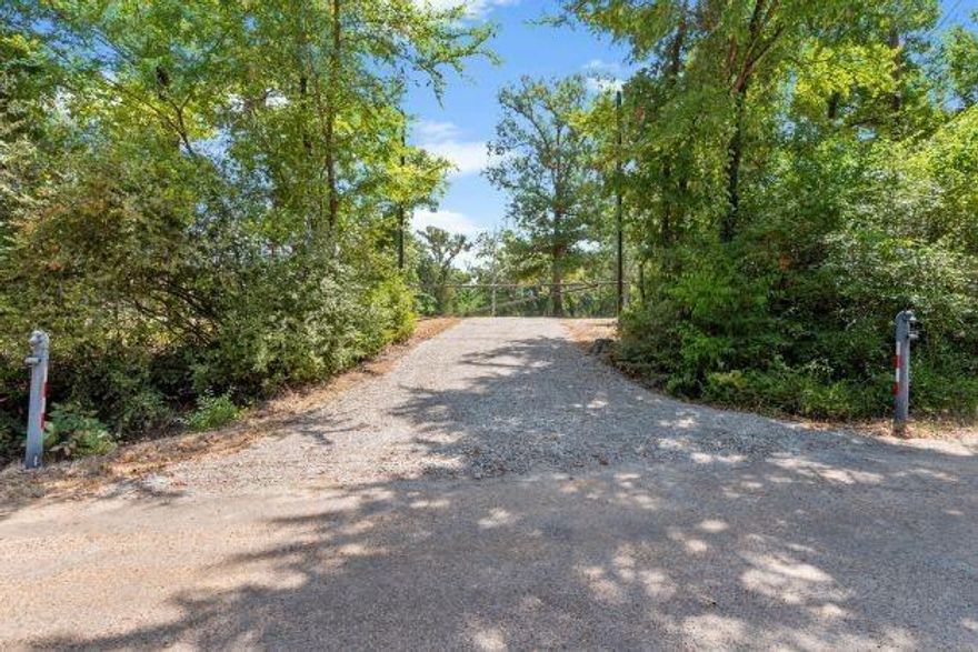 Stunning property consisting of 4 lots totaling approximately 2.5 acres to be sold as one. This premier building site has been cleared to perfection and has approximately .75 acre and deep private pond and pier. This elevated property is the corner of Lance and Dusti across the street from Cedar Creek Lake with a partial view of lake. Subdivision also has a private boat launch and pier if you want to take your boat out for a cruise. This gorgeous property would be perfect for many venues especially a luxury estate building site or resort get away. Let your imagination go and let your dreams come true with this property. Must see. Pictures do not do it justice. Water is fuller now and grass has grown in. Sale includes these 4 parcels 4059.0000.0090.30, 4059.0000.0100.30, 4059.0000.0110.30, 4059.0000.0120.30, approximately 2.5 acres.