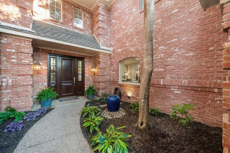 This home is perfectly situated in the trees, hills and lakes of Eldorado in McKinney. The front is on a quiet cul-de-sac and the home backs up to a quiet greenbelt with a view of the lake and golf course. The living room opens onto a 23' x 15' deck which is wonderful for entertaining friends and family.     Come see the architecture of this stunning home with its courtyard entry, detailed crown molding, large windows, classic updates and more. The HUGE primary suite is upstairs, with a fireplace and its own private balcony!  2 other BR up with a jack-n-jill bath. The first-floor office has an attached bath and adjacent closet, which could function as fourth bedroom.  The large, light-bright, gourmet kitchen has Beautiful granite counters, 2 walk-in pantries, glass cabinets fronts, under cabinet lighting, double oven, and a trash compactor. Just a golf cart drive to the award-winning, Valley Creek Elementary school. Easy access to 75, 121 and the historic McKinney Square. 2026 - refreshed with new carpet (please wear shoe covers provided, or remove shoes), walls, cabinets, ceilings and trim painted throughout. Come see it today!