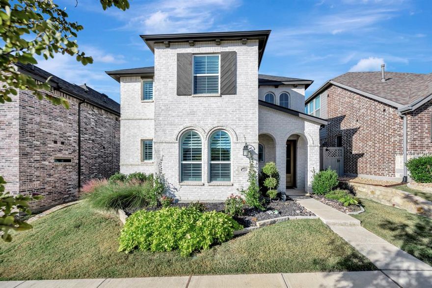 Welcome to this stunning two-story white brick home offering the perfect blend of modern comfort, convenience, and community living! Featuring 4 spacious bedrooms and 3 full baths, this home impresses from the moment you step inside with its bright, open floor plan and thoughtful design.  The heart of the home is the expansive kitchen—complete with a huge island, abundant cabinetry, hand made custom backsplash tiles and plenty of workspace to satisfy all your cooking and entertaining needs. Upstairs, a versatile loft area provides extra space for a game room, home office, or cozy retreat. The primary suite serves as a peaceful oasis with a luxurious en suite bathroom, offering privacy and relaxation away from the rest of the home.  The home office features custom built ins. Enjoy the outdoors on the covered patio overlooking a beautifully fenced low maintenance turf backyard—ideal for hosting gatherings, playing games, or simply unwinding. Additional features include a tankless water heater, replaced roof in 2024 with upgraded shingles, AC controlled garage and modern finishes throughout.   Located in a desirable community filled with amenities such as a pool, fitness center, playgrounds, and scenic walking trails, this home offers an active and welcoming lifestyle. Just minutes from award-winning schools in Northwest ISD with elementary and middle school located in the neighborhood. Close to major highways, and abundant shopping and dining options—everything you need is close at hand.  Move quickly—homes like this don’t last long!