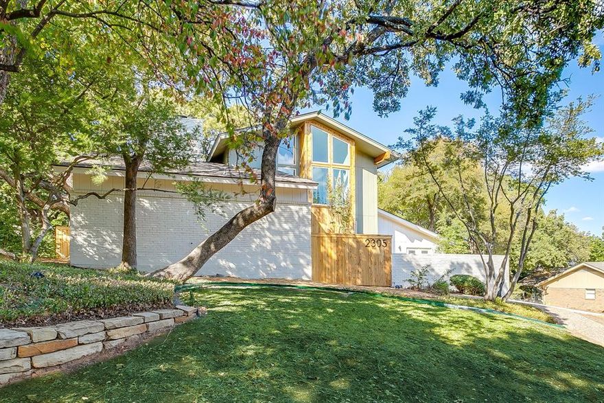 Welcome to this thoughtfully renovated home combining warm tones, marble, limestone, and natural light, while complementing the beauty of its modern architecture.  Sitting on just over a 3rd of an acre and resting underneath a canopy of beautiful oak trees, the backyard is highlighted by a renovated pool, and backyard patio, and new board on board fencing. It feels like a private retreat! The large bank of windows in the living, dining, and kitchen give unobstructed views of your backyard, as you flow easily through the downstairs. Great for hosting, or scaling back and relaxing on a quiet evening. Renovations include electrical work, new water heater, plumbing, flooring, taj mahal counters and redesigned kitchen, primary suite, and ensuite bath. So much to enjoy here!
