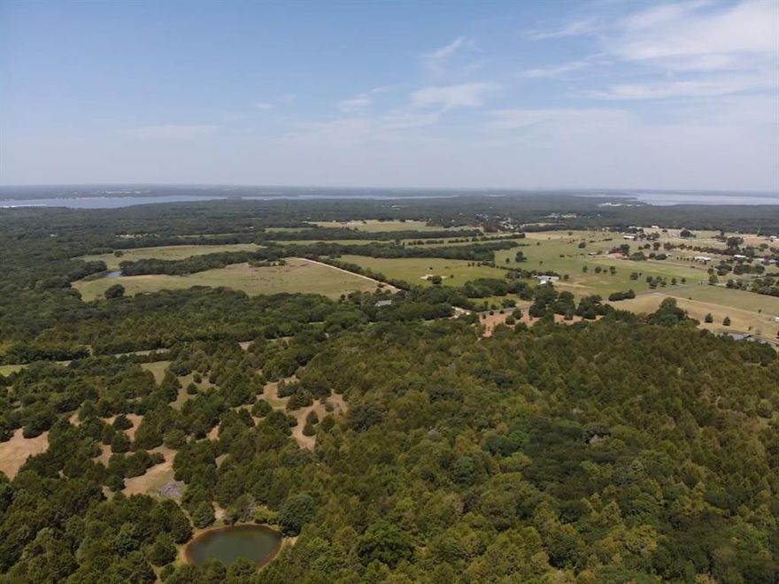 Take advantage of this rare opportunity to own 11 acres of beautiful countryside in Pottsboro, Tx! Just minutes from town amenities, major highways and all that Lake Texoma has to offer! Perfect size acreage to build your dream home, stay ag exempt and enjoy all your favorite outdoor ventures! Just a short ride to several boat ramps, marinas, beaches and resorts for all your lake activities. A perfect location to have it all, come take a look today! There are 3-11 acre tracts available. Tracts will need to be surveyed, photo included is of a preliminary plat only.