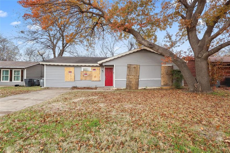 Layout includes 4 bedrooms, 1 bathroom, an open living area, and a converted garage space. The property also features a large fenced backyard. Located near Camp Wisdom with quick access to Hwy 35E, UNT Dallas, shopping, and restaurants. Ideal opportunity for investors or buyers seeking a renovation project.
