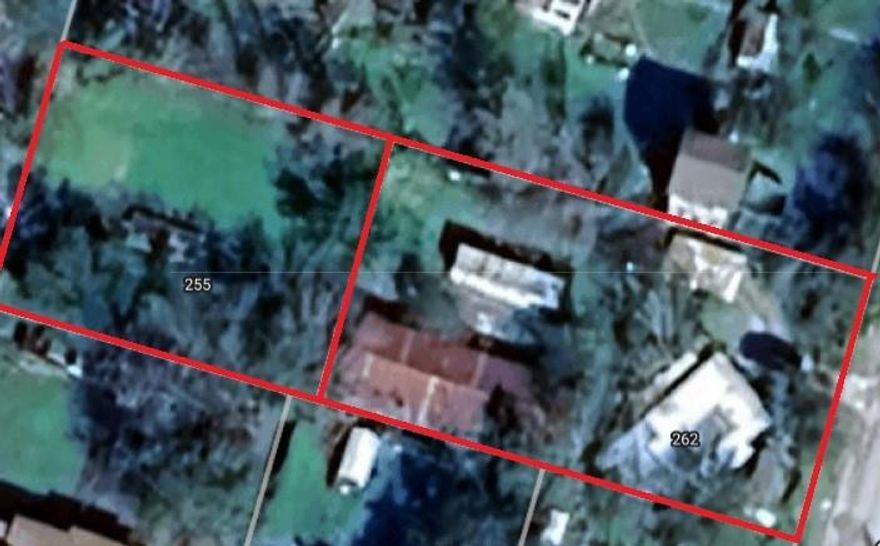 Rare find! This versatile 2 city street lot offers utilities available on both streets, making it ideal for future development or multiple property builds. The fully fenced property boasts beautiful, mature trees and includes a 1,281 sq ft shop with concrete flooring and electrical — perfect for storage, a workshop, or potential conversion.

Currently, there's a tenant renting an RV spot (RV not included). The renter is willing to stay, providing immediate income for the new owner.

This property has serious potential and is ready for your vision — whether you're looking to develop, invest, or create a custom space.