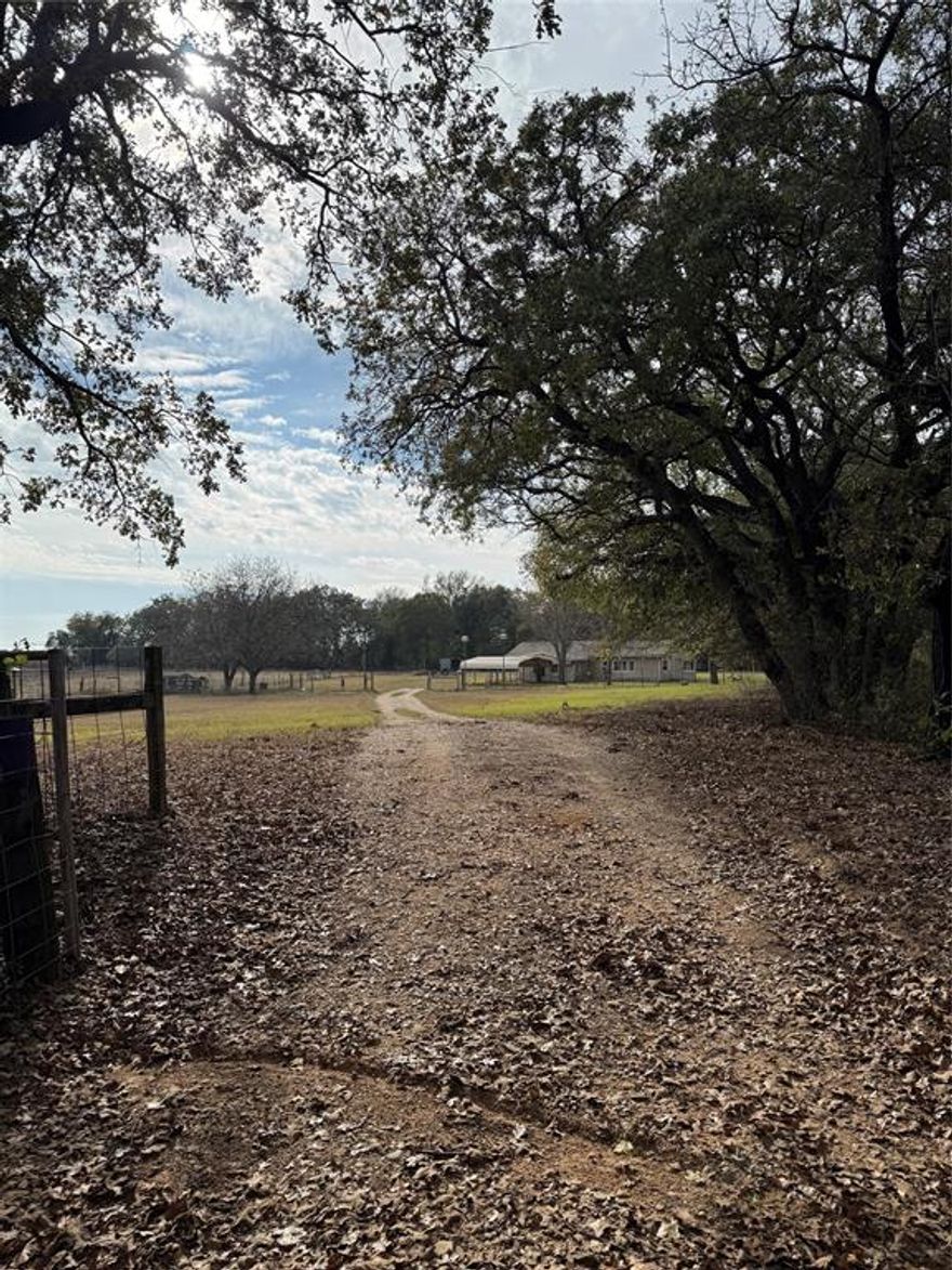 John Adams:
 Discover your ideal homestead on this beautiful 10-acre fenced property in Gholson, Texas, just minutes from Waco yet tucked away in a peaceful, quiet setting. This versatile tract features a 2-bedroom, 2-bathroom home, a carport, and a storage shed, giving you comfort and practicality from day one.

The land is already set up for animals with four dedicated pens, animal sheds, and a metal pole barn perfect for hay, equipment, or additional storage. Mature oak trees are scattered throughout the acreage, offering shade, character, and a true Texas landscape feel.

Whether you’re starting a homestead, expanding your livestock operation, or looking for a serene country retreat, this property is ready to go. Start your homestead today on this amazing piece of Gholson countryside!

John Adams: