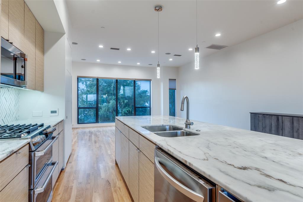 DWELLINGS AT HASKELL CONDO - Residential