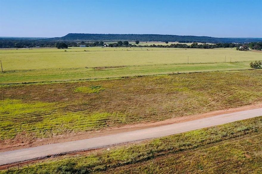 Own this beautiful 1.052 Acre lot and power ready! located in Palo Pinto County just minutes from downtown Mineral Wells, TX. This property feature gorgeous rural views and offers the perfect balance of peaceful country living with convenient access to town.

You can place your manufactured home or build your dream home—the choice is yours! this lot includes overhead power, Water Well reports, and a septic verification letter, providing everything you need to start your new homestead or private retreat.

With no restrictions, you have the freedom to bring your animals, garden, or design your ideal country lifestyle. These lots are ready for your vision!